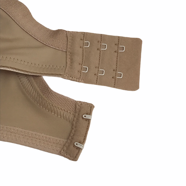 Close-up of Fantasie nude bra back closure showing 3-column, 2-row hook and eye panel.