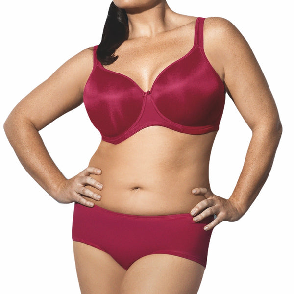 Elomi seamless cherry red bra and matching boyshort set on model – bold color, smooth silhouette.