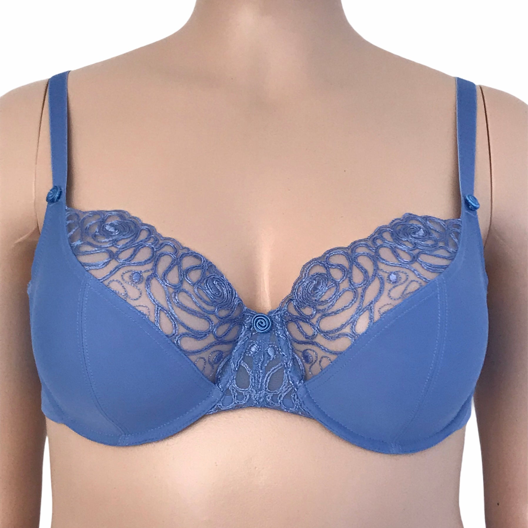 Front view of Harmony bra in cornflower blue on mannequin – sheer embroidered upper cups and floral center gore detailing.