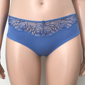 Front view of Harmony panty in cornflower blue on mannequin – features wide embroidered mesh waistband with rose detailing.